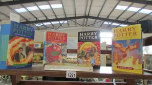 5 Harry Potter books including first editions.