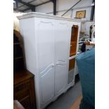 A white melamine 3 door wardrobe with mirrored door, height 199cm, width 136cm approx.