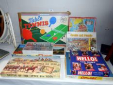 A quantity of games and jigsaws including The Battle of Little Big Horn and table tennis