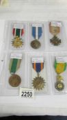 A sheet of 6 foreign medals including Saudi Arabia Liberation of Kuwait.