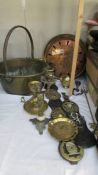 A copper warming pan, a brass jam pan, horse brasses etc.