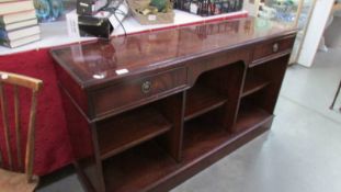 A dark wood stained sideboard with 2 drawers and open front.