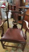 A period lyre back mahogany elbow chair