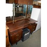 A triple mirror and darkwood dressing table, height 130cm,