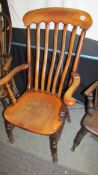 A Windsor farmhouse chair.