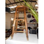 A tall pine kitchen/bar stool