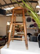 A tall pine kitchen/bar stool