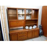 A modern wall unit with glass and drinks cabinet, height 183cm,