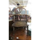 A Whetland Rockley ash/elm/yew child's Windsor chair.