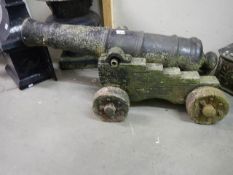 An old cast concrete good design cannon on stand.