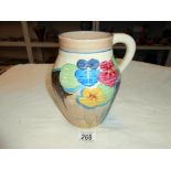 A Clarice Cliff Bizarre jug 'Pansies' minor ware to paint on rim, but hardly noticeable,