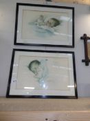 A pair of framed and glazed 1930's prints of babies.