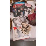 A mixed lot of Beatles memorabilia including CD, video, books, cards etc.