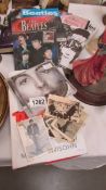 A mixed lot of Beatles memorabilia including CD, video, books, cards etc.