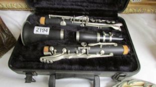 A cased clarinet.