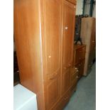 A 2 door Alstons furniture wardrobe with drawer at bottom, height 190cm, width 76.5cm approx.