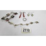 A quantity of silver jewellery being pendant earrings, bracelet designed as daisies,