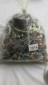 A bag of approximately 3kg of assorted costume jewellery.