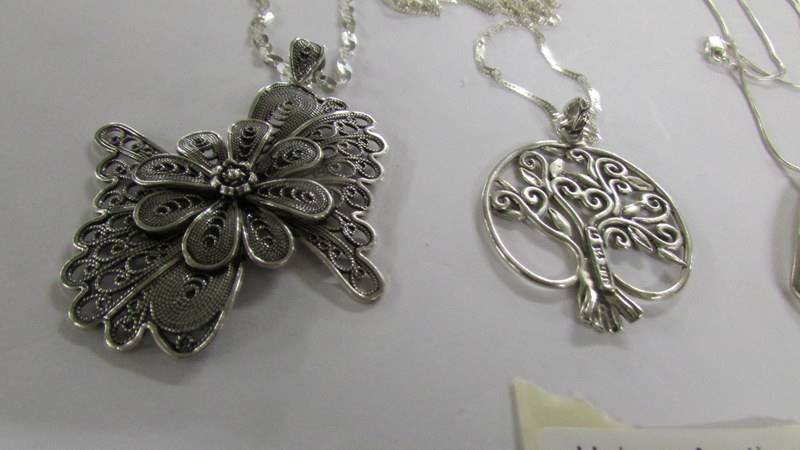 4 assorted silver pendants. - Image 3 of 3