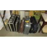 A quantity of briefcases, suit case, hard case etc.