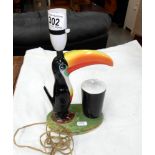 A Carlton Ware Guinness Toucan table lamp, base damaged and repaired,