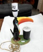 A Carlton Ware Guinness Toucan table lamp, base damaged and repaired,