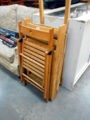 4 folding wooden chairs