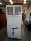 A vintage painted kitchen unit.