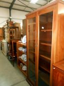 A solid mahogany 2 door glazed bookcase, 5 shelves, with key, height 186.5cm, width 95cm, approx.