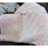 A single pink candlewick bedspread in good condition, 178 x 256 cm.