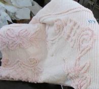 A single pink candlewick bedspread in good condition, 178 x 256 cm.