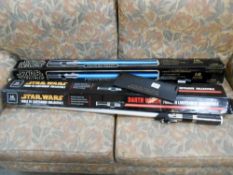 2 Star wars light sabers (Anakin and Darth Vader) stand with Darth Vader but no brackets,