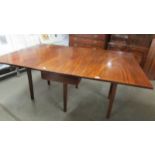 A Victorian mahogany drop leaf table, in good condition, extended size 703 x 170 cm.