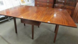 A Victorian mahogany drop leaf table, in good condition, extended size 703 x 170 cm.