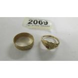 A 9ct gold wedding ring and a 9ct gold heart ring, 5.2 grams.
