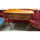 A walnut 2 drawer side table.