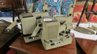 Two vintage Eumig P8 projectors.