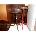 A darkwood stained tripod side table, height 47cm, diameter 30cm, approx.