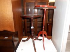 A darkwood stained tripod side table, height 47cm, diameter 30cm, approx.