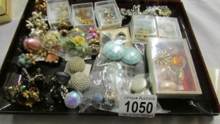 A good lot of assorted clip on earrings.