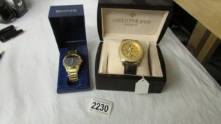 2 boxed wrist watches including Sekonda and one marked Patek Philippe.