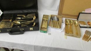 Approximately 82 pieces of Solingen gold plated cutler, part cased.