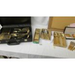 Approximately 82 pieces of Solingen gold plated cutler, part cased.