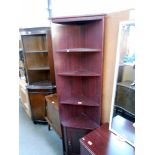 A darkwood effect corner cupboard, height 183cm, width at widest 52cm, depth 30cm approx.