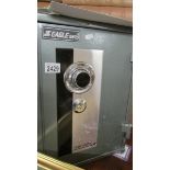 A good 20th century metal safe, made by Eagle, keys and combination with paperwork.