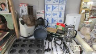 A good mixed lot of kitchen ware including new utensils, baking tray, vintage Moulinex mixer,