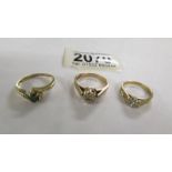 Three gold rings set stones, total weight 7 grams.