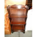 Darkwood stained book shelves with a drawer, height 113cm, width 57cm approx.