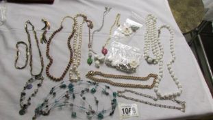 A mixed lot of necklaces,