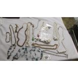 A mixed lot of necklaces,